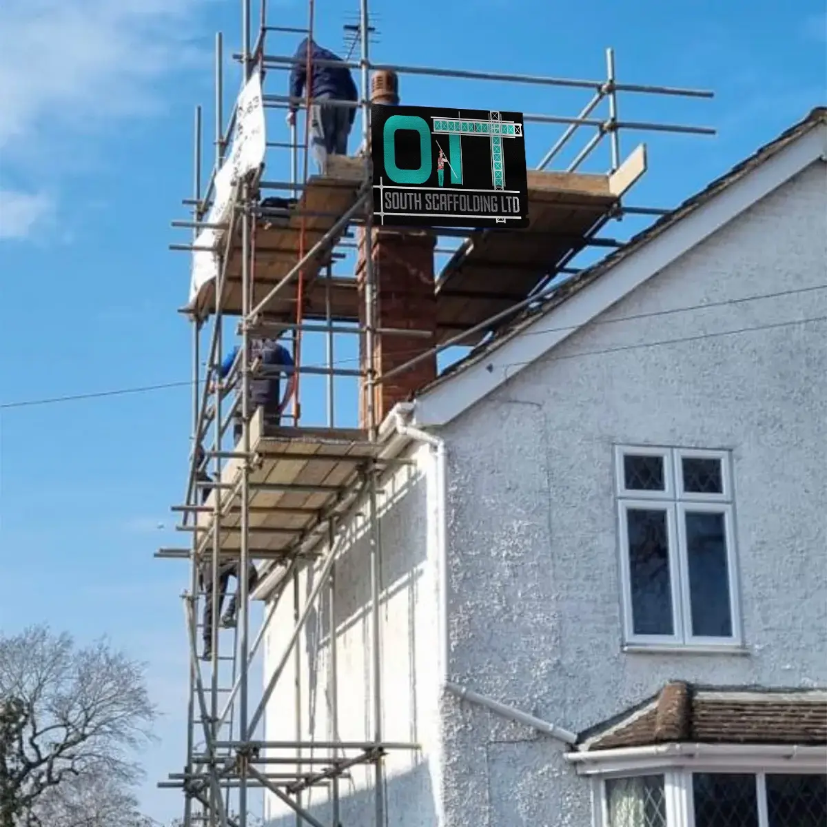 a man standing on a scaffold on top of a building