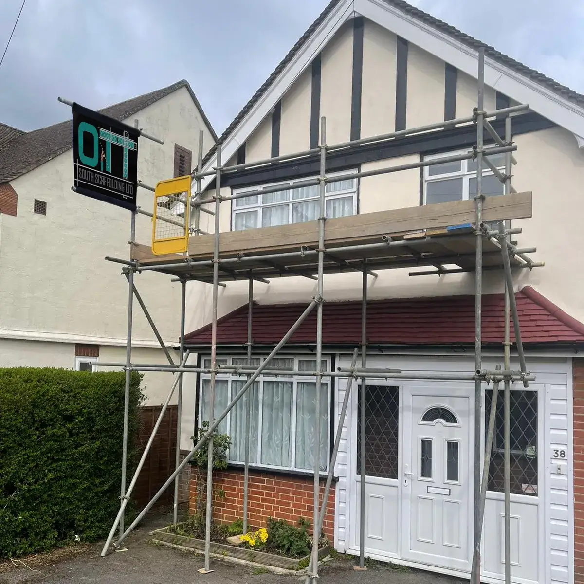 a house with scaffolding on the front of it