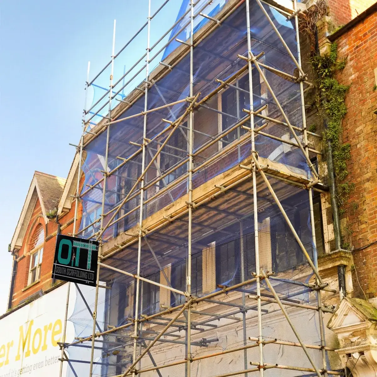 a building with scaffolding on the front of it