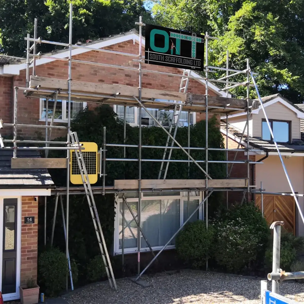 a house with scaffolding around the front of it